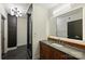 Bathroom with a single vanity and walk-in shower at 715 N Graham St # 201, Charlotte, NC 28202