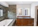 Bathroom with double vanity and a large soaking tub at 715 N Graham St # 201, Charlotte, NC 28202