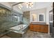 Spa-like bathroom featuring a soaking tub and modern finishes at 715 N Graham St # 201, Charlotte, NC 28202