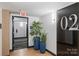 Building hallway with plants and modern decor at 715 N Graham St # 201, Charlotte, NC 28202