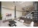 Open living area with modern kitchen and high ceilings at 715 N Graham St # 201, Charlotte, NC 28202