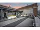 Spacious rooftop terrace with fireplace, seating, and city views at 715 N Graham St # 201, Charlotte, NC 28202