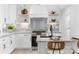 Bright kitchen with white cabinets, granite countertops and stainless steel appliances at 3001 Sparrow Springs Rd, Gastonia, NC 28052