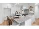 Modern kitchen with white cabinets, granite countertops and a farmhouse sink at 3001 Sparrow Springs Rd, Gastonia, NC 28052