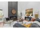 Open living space featuring a modern fireplace and hardwood floors at 3001 Sparrow Springs Rd, Gastonia, NC 28052