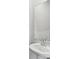 Modern bathroom with a white vanity, ample lighting, and a large mirror at 203 Alden Ct, Shelby, NC 28152