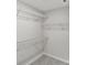 This is a walk-in closet with wire shelving and carpeted floor at 203 Alden Ct, Shelby, NC 28152