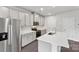 This open kitchen features modern gray cabinets and stainless steel appliances at 203 Alden Ct, Shelby, NC 28152
