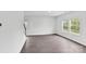 Spacious living room with hardwood floors and ample natural light from large windows at 203 Alden Ct, Shelby, NC 28152