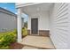 Charming porch with brick accents, leading to the front door of the house at 203 Alden Ct, Shelby, NC 28152