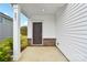 Covered porch with brick accents, offering a welcoming entrance to the home at 203 Alden Ct, Shelby, NC 28152