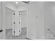 Upper level hallway with access to bedrooms and bathroom at 3000 Celia Ave, Charlotte, NC 28216