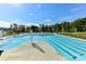 Stunning community pool featuring lap lanes and recreational area, surrounded by lush greenery at 9126 Vecchio Dr, Indian Land, SC 29707