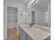 Bathroom with vanity, sink, and walk-in closet at 5346 Johnston Mill Ct, Charlotte, NC 28269