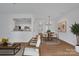 Open concept dining area with wood table and chairs, view of kitchen at 5346 Johnston Mill Ct, Charlotte, NC 28269