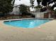 Community swimming pool with surrounding deck at 5346 Johnston Mill Ct, Charlotte, NC 28269