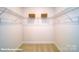 Walk-in closet with wire shelving and carpeting at 121 Sari St, Troutman, NC 28166