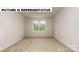 Simple bedroom with window and carpeted floor at 131 Sari St, Troutman, NC 28166