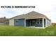 Exterior view of home with backyard at 131 Sari St, Troutman, NC 28166