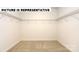 Spacious walk-in closet with wire shelving at 131 Sari St, Troutman, NC 28166