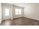 Bright entryway with hardwood floors and white door at 179 Wembury Ln, Troutman, NC 28166