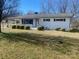 Ranch home with nice landscaping and trimmed bushes in front yard at 2626 S Main St, Concord, NC 28027