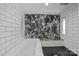 Luxurious bathroom featuring a soaking tub and a walk-in shower with stylish black and white tiles at 2733 Wellington St, Rock Hill, SC 29732