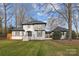 Charming two-story home with a manicured front yard and a detached garage at 2733 Wellington St, Rock Hill, SC 29732