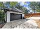 Spacious two-car garage with a large driveway, privacy fence and well kept lawn at 2733 Wellington St, Rock Hill, SC 29732