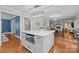 Bright, modern kitchen featuring an island with bar seating and built-in microwave at 2733 Wellington St, Rock Hill, SC 29732