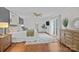 Bright main bedroom with hardwood floors, a ceiling fan, and a balcony access at 2733 Wellington St, Rock Hill, SC 29732