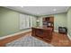 Home office featuring a large wooden desk and a built-in bookcase at 2733 Wellington St, Rock Hill, SC 29732