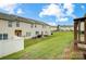 Spacious backyard showing the building at 9345 Hamel St, Charlotte, NC 28215