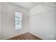 Bright closet space with window and wire shelving for optimal storage and organization at 9345 Hamel St, Charlotte, NC 28215