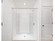 Bright shower features a built-in shower caddy and sliding door, perfect for a quick and easy clean at 9345 Hamel St, Charlotte, NC 28215