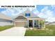 Charming single-Gathering home with a well-manicured lawn and attached two-car garage at 115 Sari St, Troutman, NC 28166