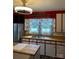 Charming kitchen with red and white cabinets and stainless steel appliances at 949 Grace Ave, Lancaster, SC 29720