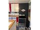 Modern kitchen with stainless steel oven and black brick wall at 949 Grace Ave, Lancaster, SC 29720