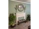 Cozy living room featuring a decorative fireplace with a tree art piece at 949 Grace Ave, Lancaster, SC 29720