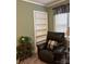 Relaxing living room with built-in bookcase, cozy recliner and natural light at 949 Grace Ave, Lancaster, SC 29720