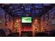 Decorated living room with sofas, Christmas trees and colorful signs at 949 Grace Ave, Lancaster, SC 29720
