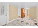 Hallway featuring tile floors and a built-in cabinet at 405 7Th St, Spencer, NC 28159