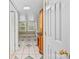 Hallway featuring tile floors and a built-in cabinet at 405 7Th St, Spencer, NC 28159