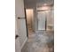 Bathroom with glass enclosed shower featuring white subway tiles, a built-in bench and modern fixtures at 4069 Port Richmond Ave # 16, Gastonia, NC 28056