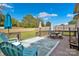 Spacious deck with seating area, overlooks fenced backyard at 410 Gaddy St, Kannapolis, NC 28081