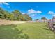 Large grassy backyard with wooden privacy fence at 410 Gaddy St, Kannapolis, NC 28081