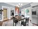 Bright dining area with table and chairs, view into kitchen and living room at 410 Gaddy St, Kannapolis, NC 28081