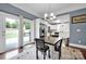 Bright dining area with table and chairs, near kitchen access at 410 Gaddy St, Kannapolis, NC 28081