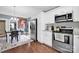 Updated kitchen featuring stainless steel appliances and granite counters at 410 Gaddy St, Kannapolis, NC 28081