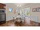 Charming dining area with seating for four and access to a sunroom at 984 Kirby Dr, Fort Mill, SC 29715